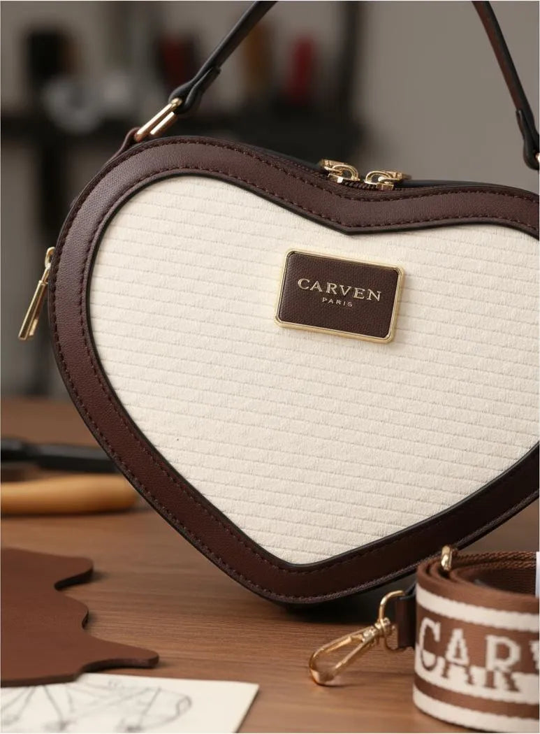 Cartera morral bandolera corazon para dama Carven Paris