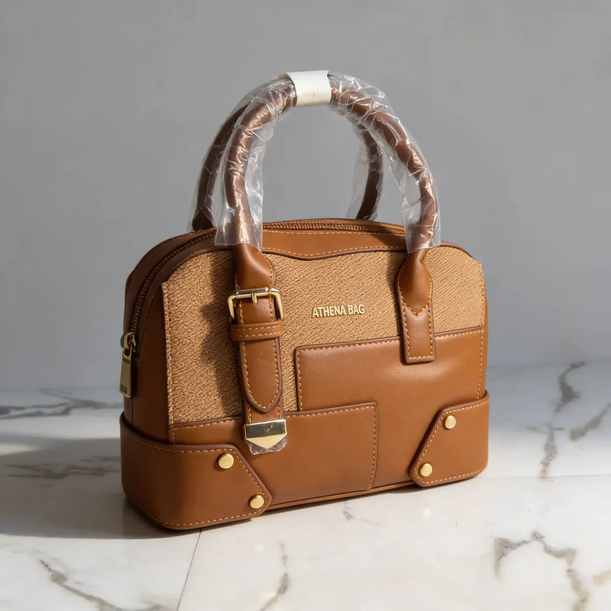 Cartera de mano morral A5 baúl Athena Bag