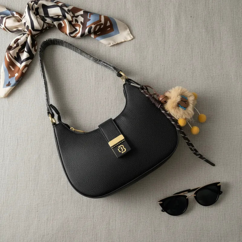 Cartera baguette con charm Unibella