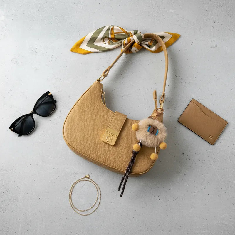 Cartera baguette con charm Unibella