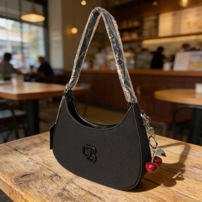 Cartera baguette con charm cereza Unibella