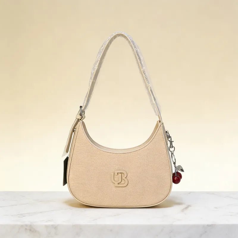 Cartera baguette con charm cereza Unibella